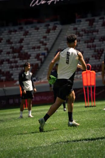Player running a drill in GOINTO training gear